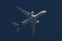 N851FD - Overflying Guernsey, enroute Paris - Memphis, lit by the evening sun - by alanh