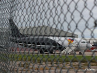 G-JMCT @ EGPD - Seen through the fence at Aberdeen Airport, Scotland EGPD - by Clive Pattle