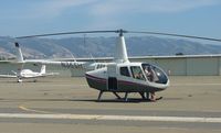 N36SH @ KRHV - A local R44 getting ready to make a vertical takeoff from the south tie downs at Reid Hillview Airport, CA. - by Chris Leipelt