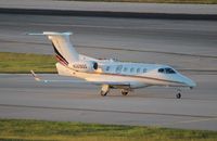 N309QS @ FLL - Net Jets Phenom 300 - by Florida Metal