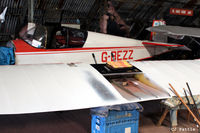 G-BEZZ @ EGCB - Under restoration by its owner at Barton, EGCB - by Clive Pattle