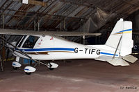 G-TIFG @ EGCB - Tucked away in a hangar at Barton, EGCB - by Clive Pattle