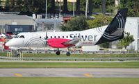 N327AG @ FLL - Silver Saab 340 - by Florida Metal