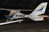 G-CGIZ @ EGCB - Hangared at Barton airfield, Manchester - EGCB - by Clive Pattle