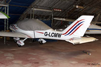 G-LCMW @ EGCB - Hangared at Barton Airfield, Manchester - EGCB - by Clive Pattle