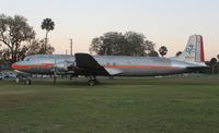 N381AA @ EVB - DC-7 to be converted into a restaurant - by Florida Metal