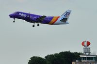 G-LGNC @ EGSH - Leaving in Flybe purple colour scheme. - by keithnewsome