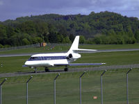 CS-DLH @ EGPH - Netjets Falcon 2000EX CS-DLH taxiing to runway 06 - by Mike stanners