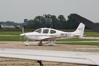 N614CY @ KAMW - Photographed by hanging over a fence and shooting over the wing of a twin Cessna. - by Glenn E. Chatfield