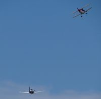 UNKNOWN @ RHV - A biplane and a T34 Mentor getting in formation after being on display at the Reid Hillview Airport Day/STEAM Festival. - by Chris Leipelt