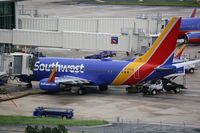 N709SW @ KTPA - Southwest Flight 3034 (N709SW) sits at the gate at Tampa International Airport prior to a flight to New Orleans International Airport - by Donten Photography