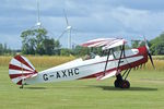 G-AXHC @ EGNF - 1946 Stampe-Vertongen SV-4C, c/n: 293 against a backdrop of wind farms at Netherthorpe - by Terry Fletcher
