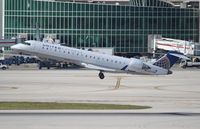 N713SK @ MIA - United Express - by Florida Metal