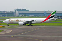 A6-EFI @ EHAM - Boeing 777-F1H [35609] (Emirates Airlines/SkyCargo) Amsterdam-Schiphol~PH 06/08/2014 - by Ray Barber