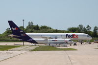 N771FD @ KCID - Parked at the FedEx ramp - by Glenn E. Chatfield