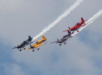 N911CG @ LAL - Firebirds Extra 300 Jack in formation with 3 others at Sun N Fun - by Florida Metal