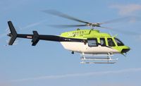 N911FS - Bell 407 at Orlando Heliexpo - by Florida Metal