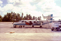 DQ-FCE @ TRW - Actually taken by my father sometime around 1975, DQ-FCE at Bonriki, Tarawa with our Mini Moke. https://www.flickr.com/photos/marktranchant/19709589330 - by Mark Tranchant