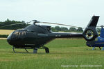 G-OMEM @ EGBT - ferrying race fans to the British F1 Grand Prix at Silverstone - by Chris Hall