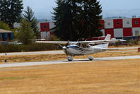 N906DG @ PLU - Cessna 182T taxing in. - by Eric Olsen
