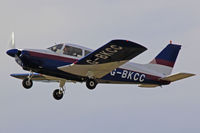 G-BKCC @ EGFH - Cherokee, Gloucestershire (Staverton) Airport based, previously OY-BGY, seen departing runway 22, en-route RTB. - by Derek Flewin