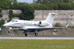 G-JAGA @ EGCC - London Executive Aviation - by Chris Hall