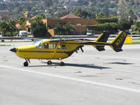 N337B @ KSQL - Colorful 1967 Cessna T337C @ @ San Carlos Airport, CA - by Steve Nation