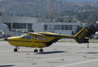 N337B @ KSQL - Colorful Cessna T337C from Laughlin, NV @ San Carlos Airport, CA - by Steve Nation