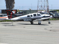 N58HG @ KSQL - 2014 Beechcraft G58 visiting from Southern California on visitors ramp @ San Carlos Airport, CA - by Steve Nation