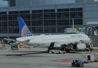 N484UA @ KSFO - United Airlines 2001 A320-232 parked @ San Francisco International Airport Terminal 1 - by Steve Nation