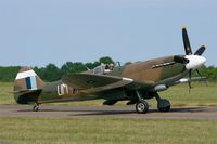 F-AZJS @ LFOT - Supermarine 389 Spitfire PR.XIX, Taxiing after landing rwy 02, Tours Air Base 705 (LFOT-TUF) Air show 2015 - by Yves-Q