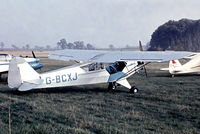 G-BCXJ @ EGTH - Piper L-4J Grasshopper [13048] Old Warden~G 30/06/1974. From a slide. - by Ray Barber