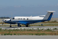 N805SA @ KSQL - Surf Airlines 2004 Pilatus PC-12/45 operating as URF305 taking off for KSBA (Santa Barbara, CA) @ San Carlos Municipal Airport, CA - by Steve Nation