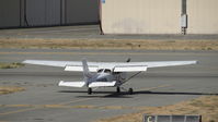 N6198N @ KRHV - Christiansen Aviation Inc (San Carlos, CA) 2008 Cessna 172S clear of 31L taxing back to more patterns at Reid Hillview Airport, San Jose, CA. - by Chris Leipelt