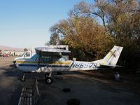 N8657S @ SZP - Sun dappled 1965 Cessna 150F in low light situation @ Santa Paula Airport, CA - by Steve Nation