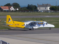 CS-TGG @ EGJB - Taxying to stand at Guernsey (taken through the terminal windows) - by alanh