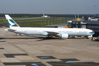 B-KPO @ EDDL - B 777 with A380 in the distance - by Günter Reichwein