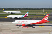 D-ABDO @ EDDL - Triple of German airlines - by Günter Reichwein