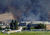 N5ZZ @ KRHV - Locally-based 1977 Cessna 182Q clear of runway 31R (note the huge fire just south of the Eastridge Mall) at Reid Hillview Airport, San Jose, CA. - by Chris Leipelt