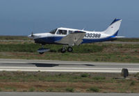 N3038B @ KSQL - 1978 Piper PA-28-236 over the threshold @ San Carlos Airport, CA - by Steve Nation
