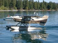 N771KE - Landing at Lake Tahoe - by Gordon Brown