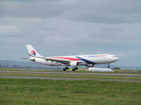 9M-MTI @ NZAA - about to touch down at AKL - by magnaman