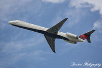 N948DL @ KSRQ - Delta Flight 2298 (N948DL) departs Sarasota-Bradenton International Airport enroute to Hartsfield-Jackson Atlanta International Airport - by Donten Photography