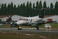 74 @ LFRN - Embraer EMB-121AN Xingu, Taxiing to holding point, Rennes-St Jacques airport (LFRN-RNS) Air show 2014 - by Yves-Q