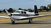 N6403Q @ KRHV - Locally-based 1967 Mooney M20C taxing in after landing at Reid Hillview Airport, San Jose, CA. Thanks for the wave! - by Chris Leipelt