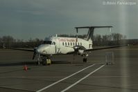 C-FCMV @ CYXJ - On tarmac at Fort St John, taken from departure area. - by Remi Farvacque