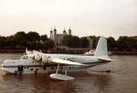 G-BJHS - G-BJHS poses gracefully on the Thames near The Tower of London - by Goat66