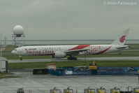 B-2035 @ CYVR - Taxiing for take-off - by Remi Farvacque