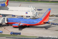 N940WN @ KTPA - Southwest Flight 2701 (N940WN) prepares for flight at Tampa International Airport prior to flight to Denver International Airport - by Donten Photography