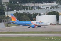 N228NV @ KTPA - An Allegiant Airbus A320 (N228NV) undergoes maintenance at Tampa International Airport - by Donten Photography